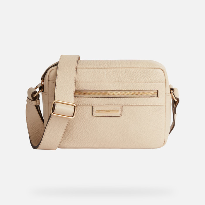 Women's Calvin Klein white and tan shoulder bag  Tan shoulder bag, Calvin  klein bag, Beige purses
